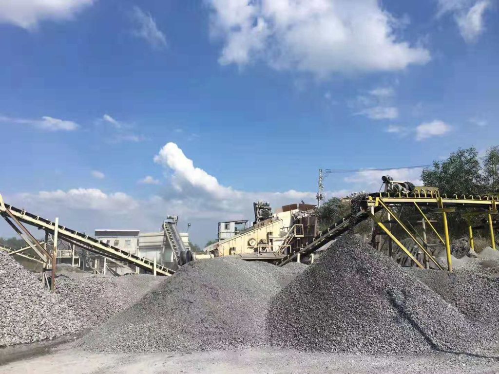 Long-running Leimeng aggregate crushing plant with finished stone piles in Southeast Asia
